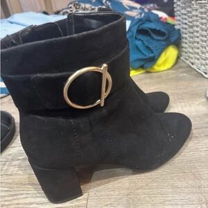 Elegant Black Heeled Boots with Gold Accent